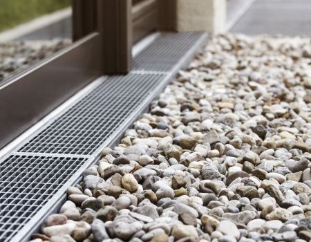 French Drains vs. Dry Creek Beds: Which Solves Yard Drainage in Chesapeake?