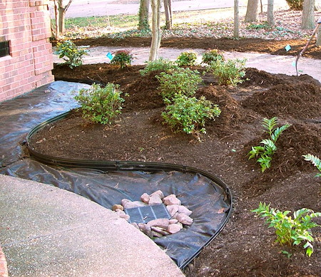 Fixing Standing Water: French Drains vs. Sump Pumps for Chesapeake Yards